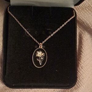 Gold Oval Pendant Necklace with Floral Design